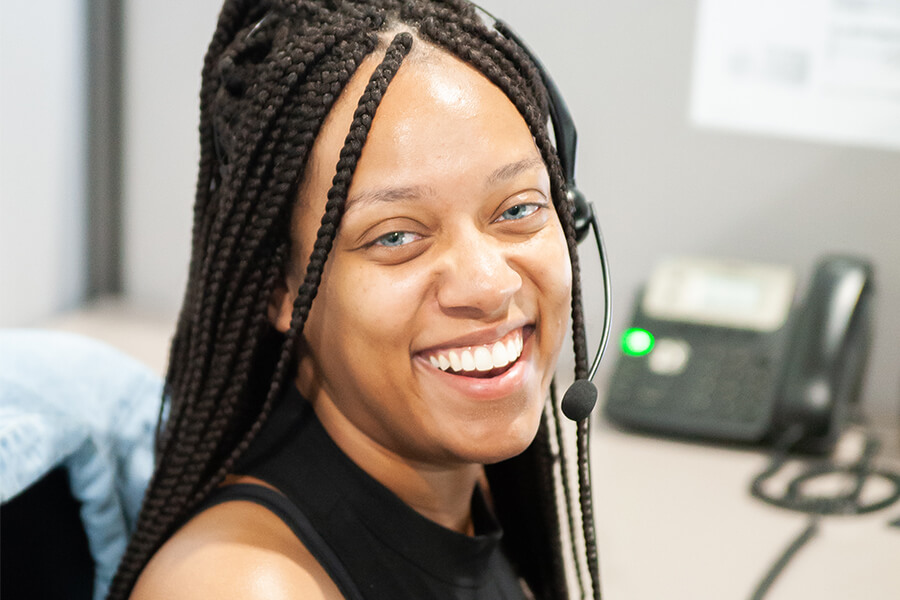 Atlas Butler employee at our 24/7 scheduling center.